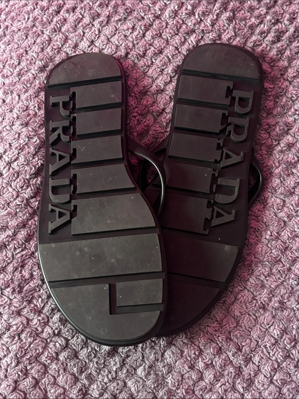 Prada Men’s Black Flip-Flop Sandals with Red Logo Accent